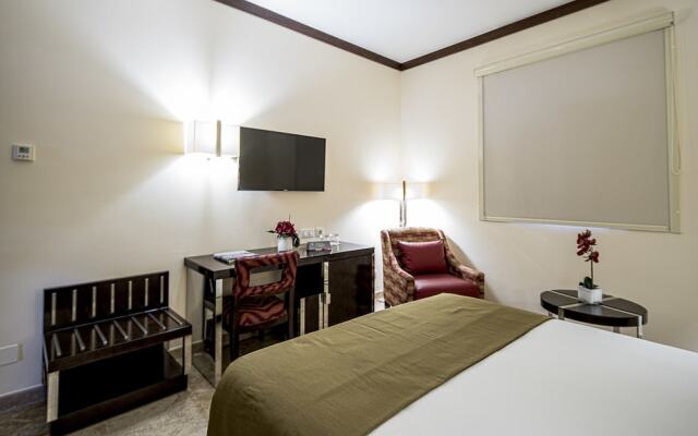 Quarto do Polly Hotel Saurimo com cama de casal, Saurimo, Angola